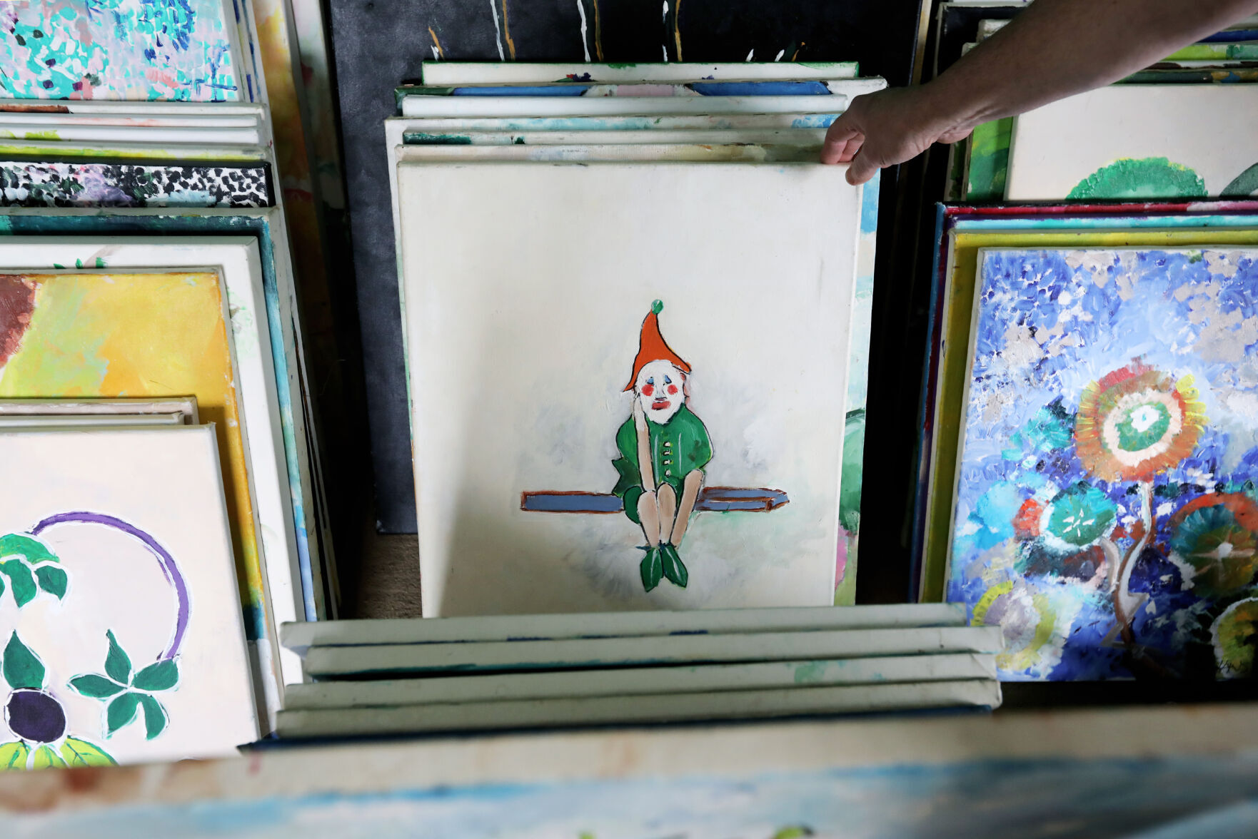 Stacks of artwork by Scott Hansen